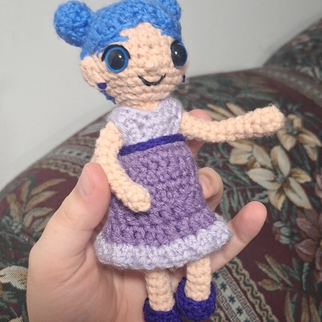 Doll with blue hair